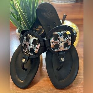 Gorgeous Tory Burch Sandals with a Beautiful Silver tory Burch emblem.